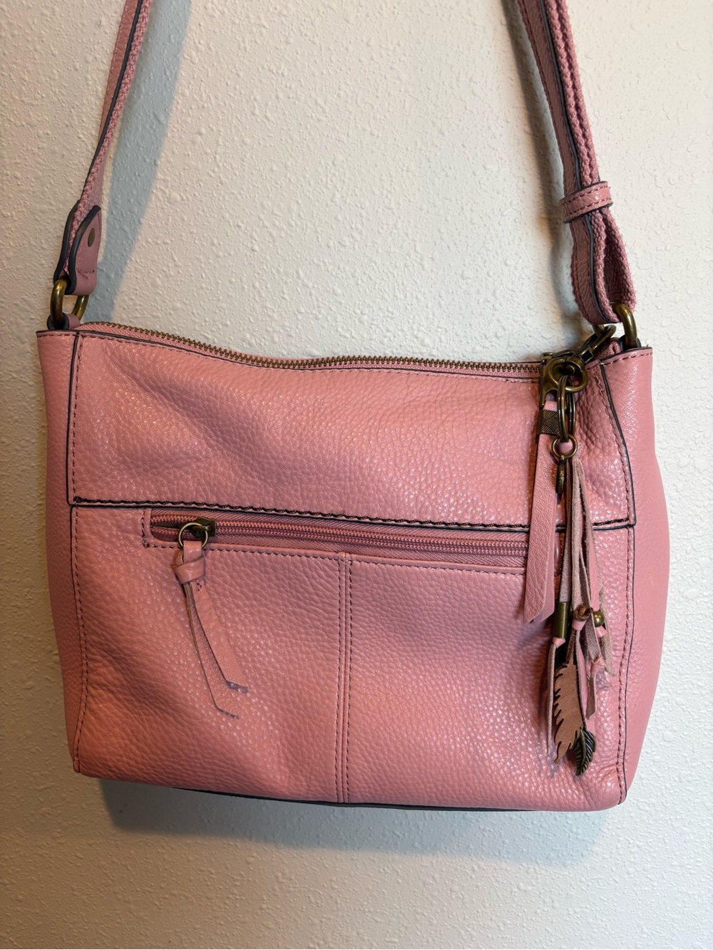 The Sak Pink Pebbled Leather Crossbody with Tassel & Feather Charms